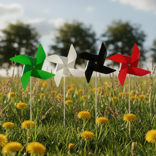 Colorful pinwheels on sticks against a plain background