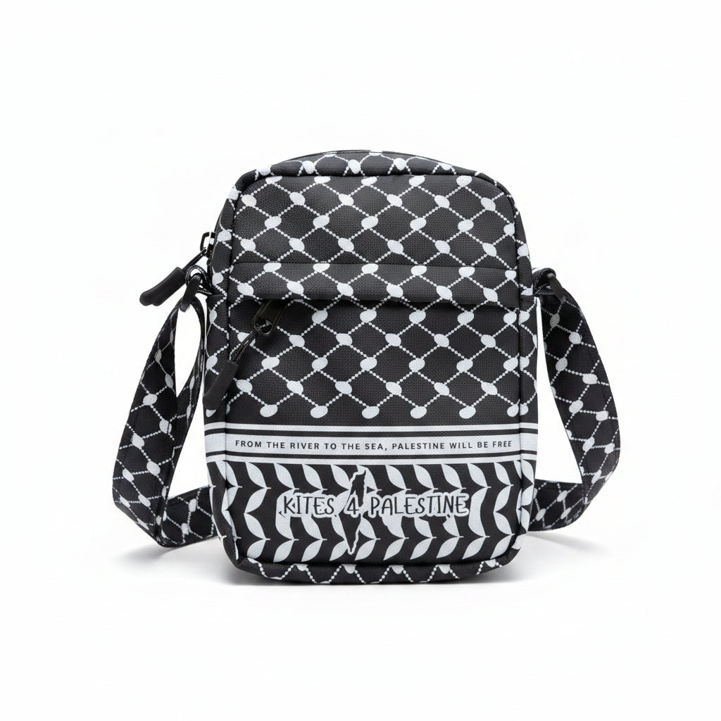 Gray and white patterned bag with 'Kites of Palestine' branding on a beige carpet.